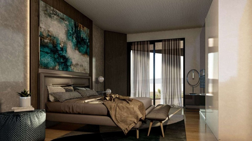 Ložnice se vstupem na terasu a výhledem na moře