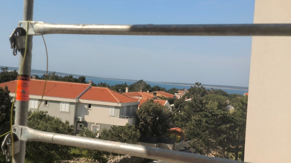 Výhled na moře z nedokončeného bytu, zvýraznění nemovitosti v Chorvatsku