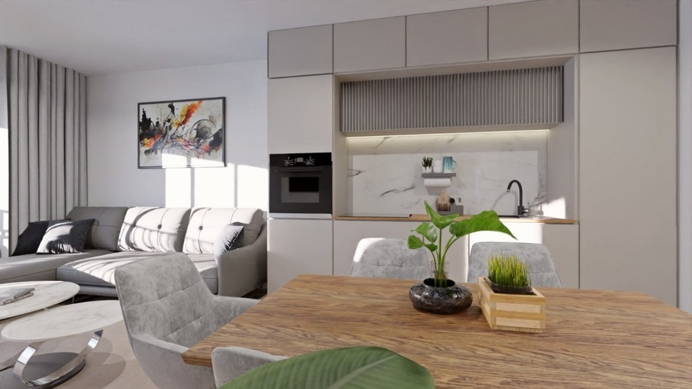 Otevřená kuchyně-obývací pokoj s útulným jídelním koutem a moderním nábytkem.