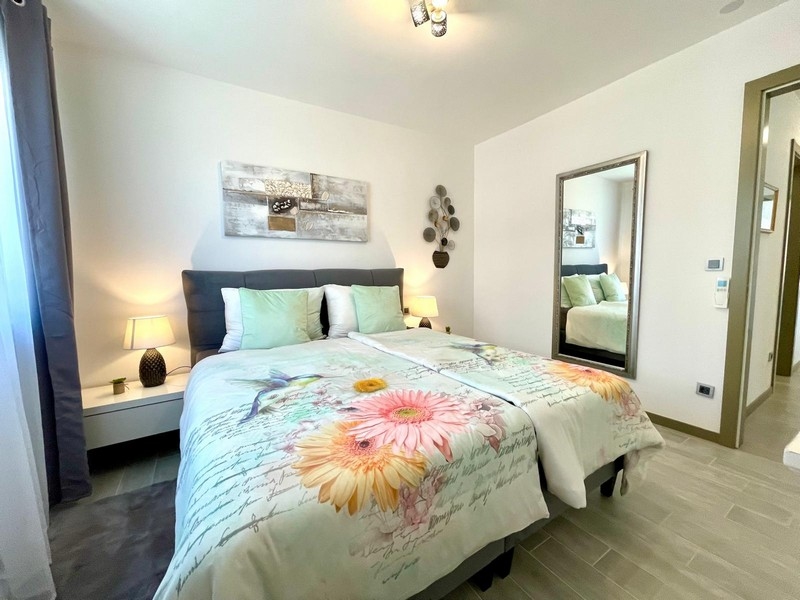 Další ložnice s pohodlnou postelí.