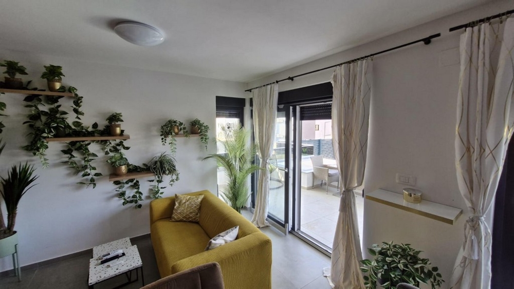 Další pohled do obývacího pokoje bytu A3413.