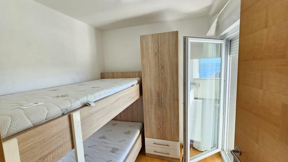 Malá ložnice s palandou