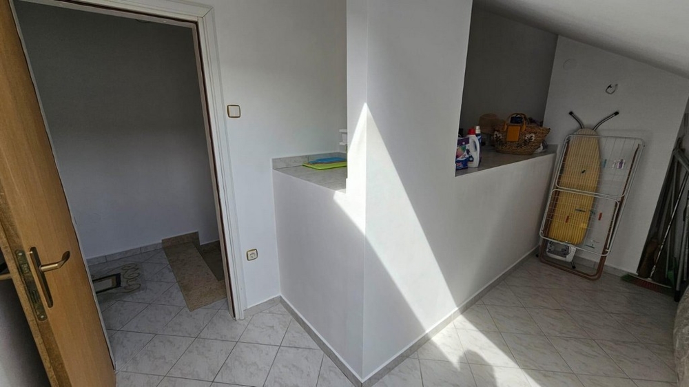 Úložný prostor s domácími potřebami