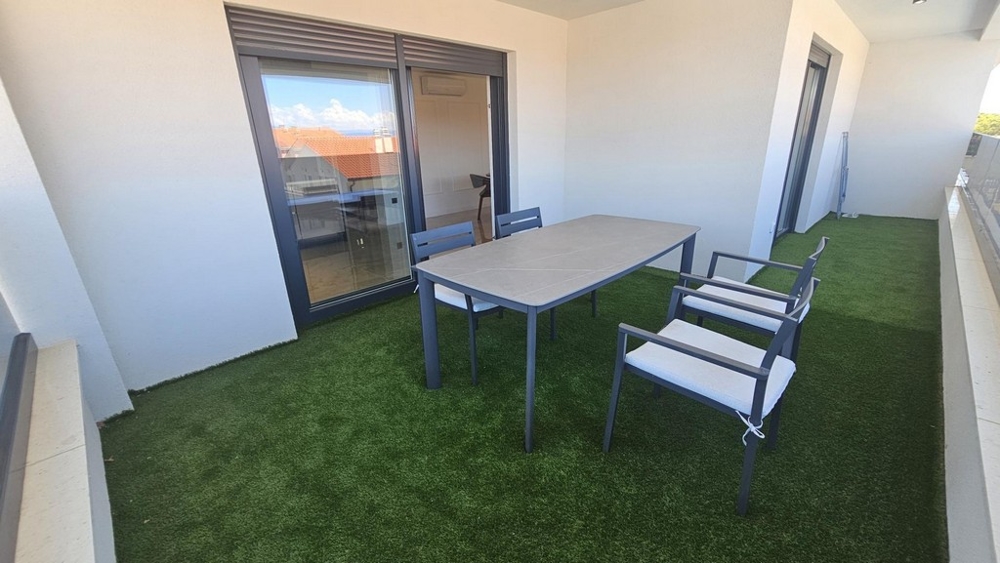 Krytá terasa s posezením