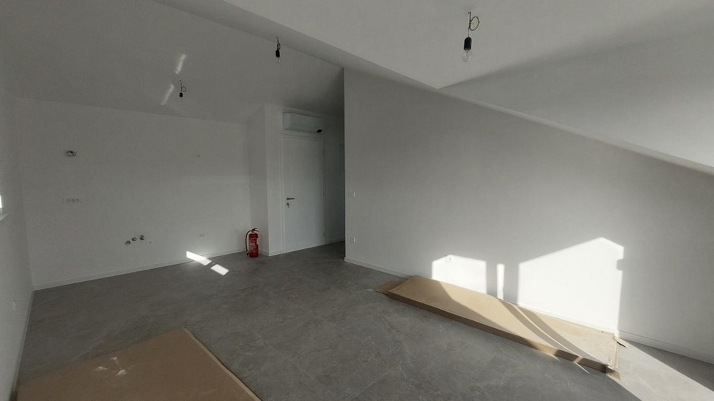 Obývací pokoj s kuchyňským koutem