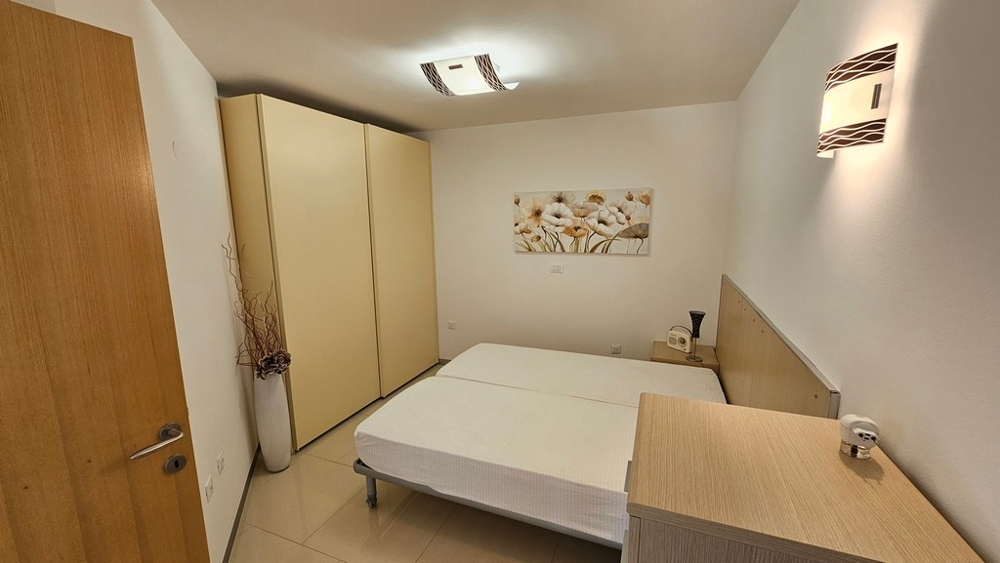 Další ložnice se samostatnými postelemi