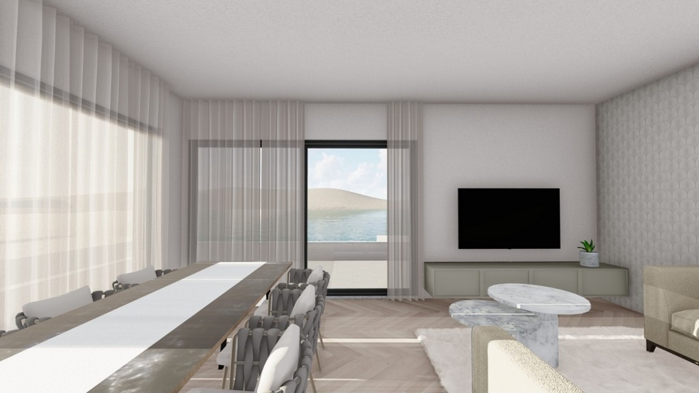 Moderní obývací a jídelní kout s přímým vstupem na terasu a výhledem na moře