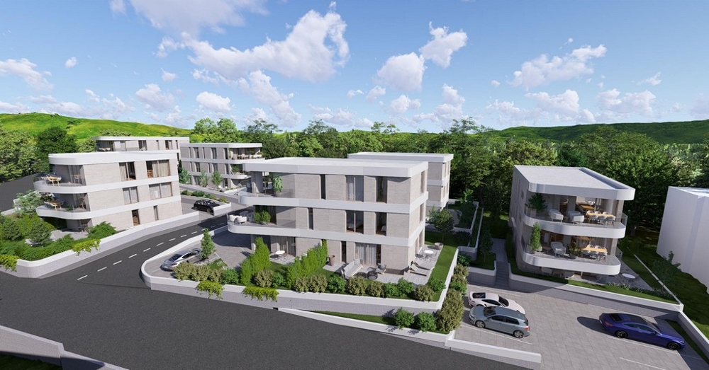 Projekt novostavby v Krku, letecký pohled na obytný komplex v přírodě