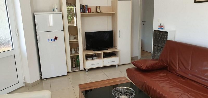 Obývací pokoj a TV.