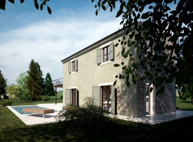 Pohled na nemovitost na Istrii s výhledem na moře, obklopený červeným listím a jasnou oblohou.