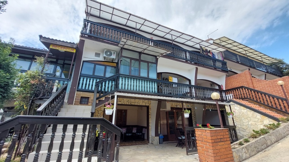 Bytový dům s 18 pokoji