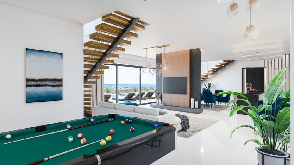 Kulečníkový stůl a výhled na TV.