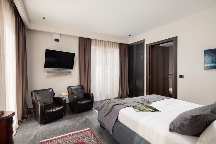 Ložnice s posezením a TV