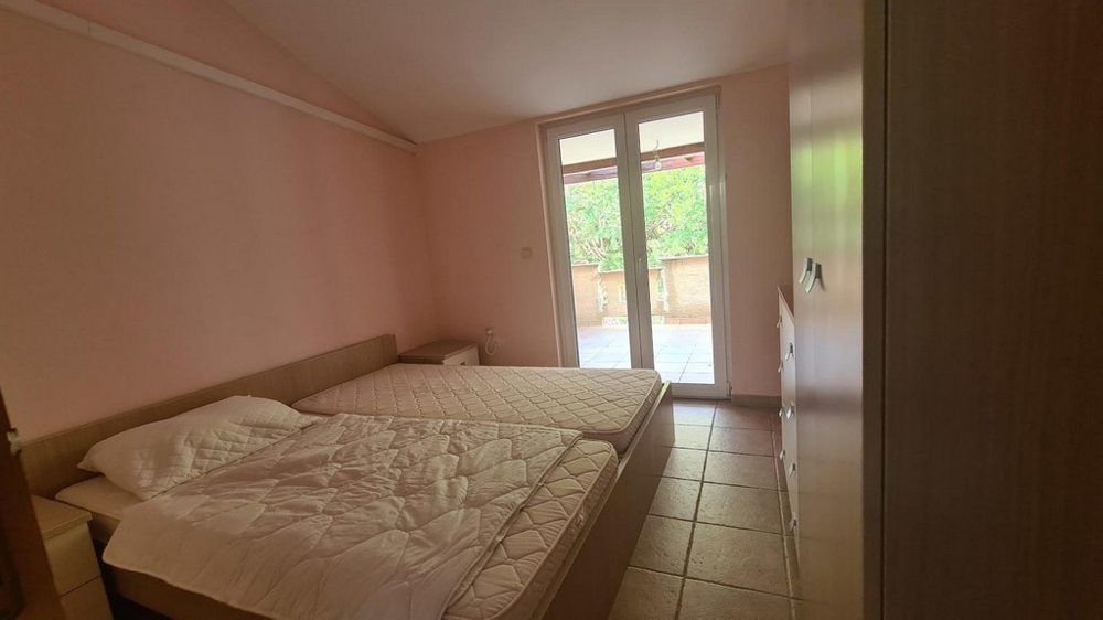 Prostor na spaní se vstupem na balkon
