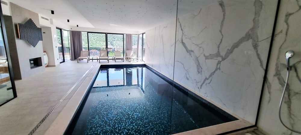 Vila s krytým bazénem a posilovnou