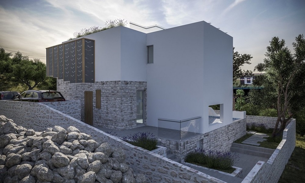 Letecký pohled na moderní vilu na prodej na ostrově Krk v Chorvatsku, se dvěma zaparkovanými auty a solárními panely na střeše