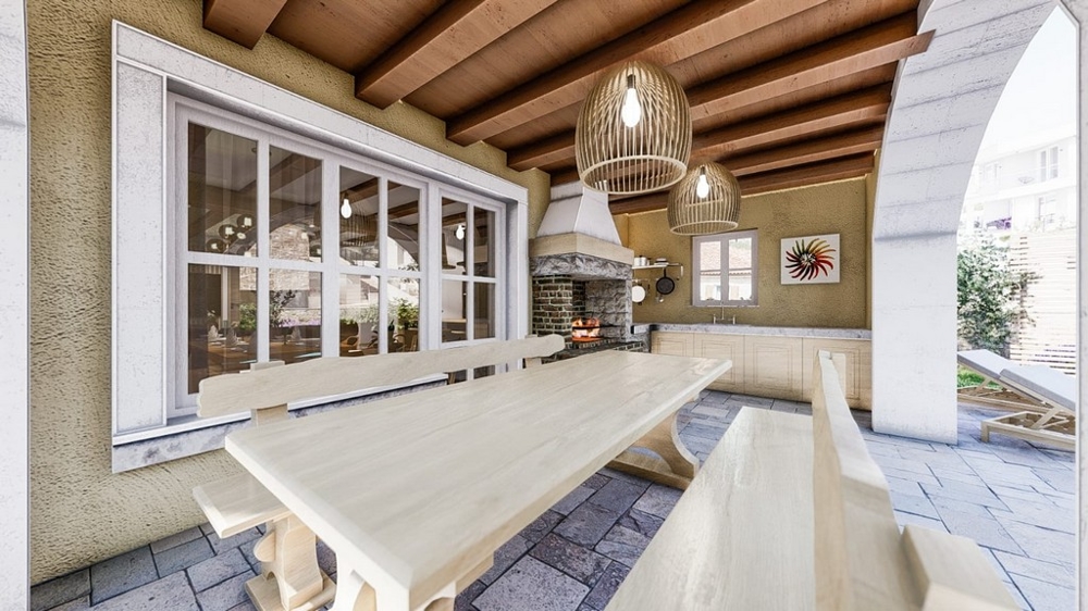 Krytá venkovní terasa s jídelním stolem ve středomořské vile na ostrově Krk