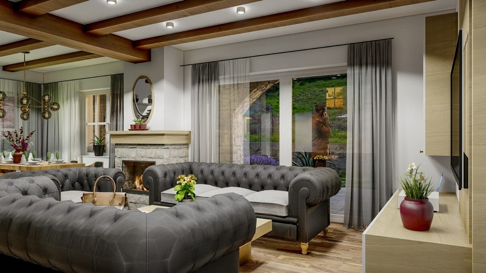 Obývací pokoj středomořské vily s elegantními šedými pohovkami a výhledem do zahrady na ostrově Krk