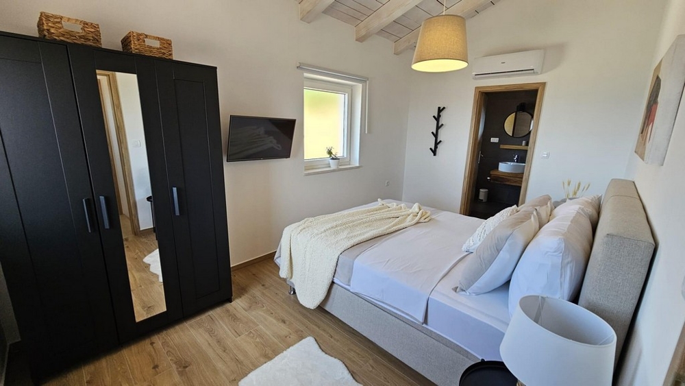 Ložnice s klimatizací.