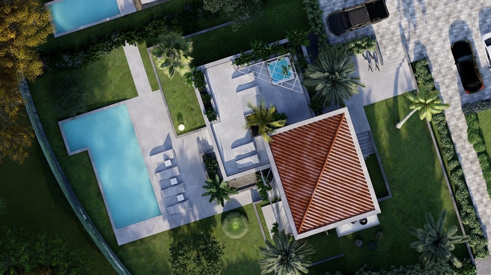 Letecký pohled na vilu s bazénem a zahradou
