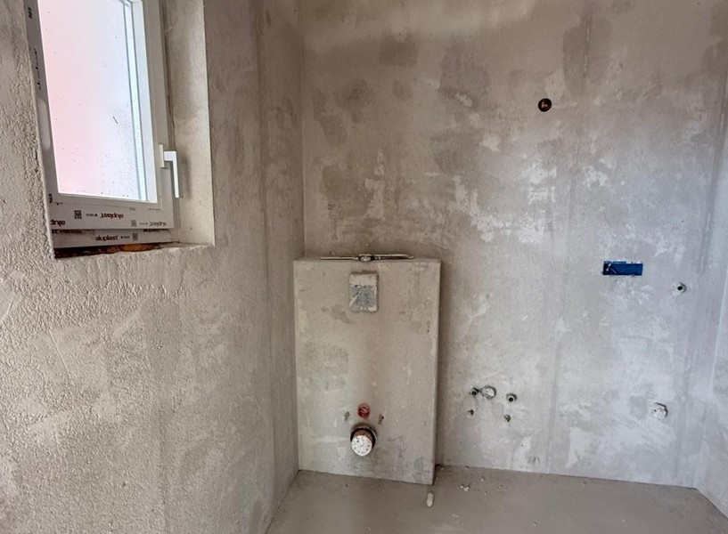 Stav pláště koupelny