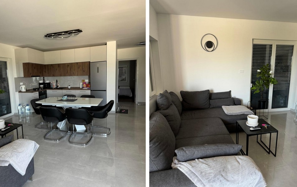 Obývací prostor s kuchyní a posezením v Haus Vir