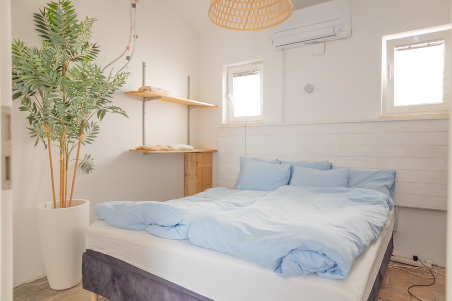 Ložnice s manželskou postelí a klimatizací