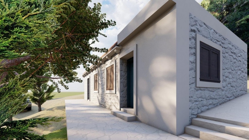 Dům s fasádou z přírodního kamene a prostorným venkovním prostorem