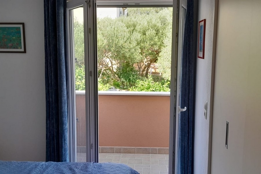 Ložnice se vstupem na balkon