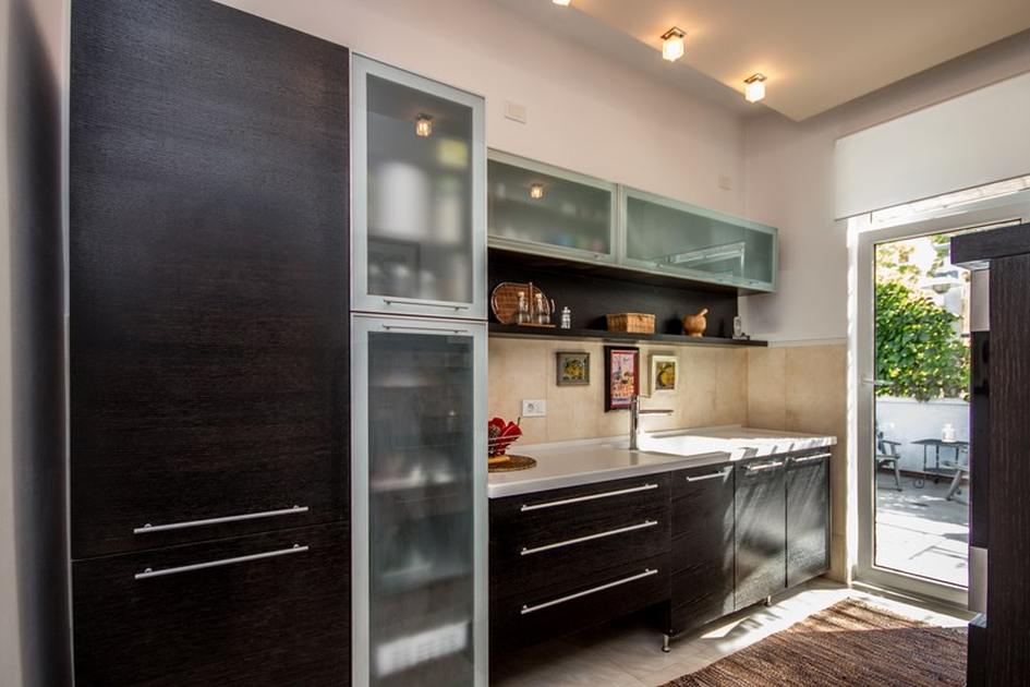 Kuchyň je také moderní a vybavená ve vysokém standardu.