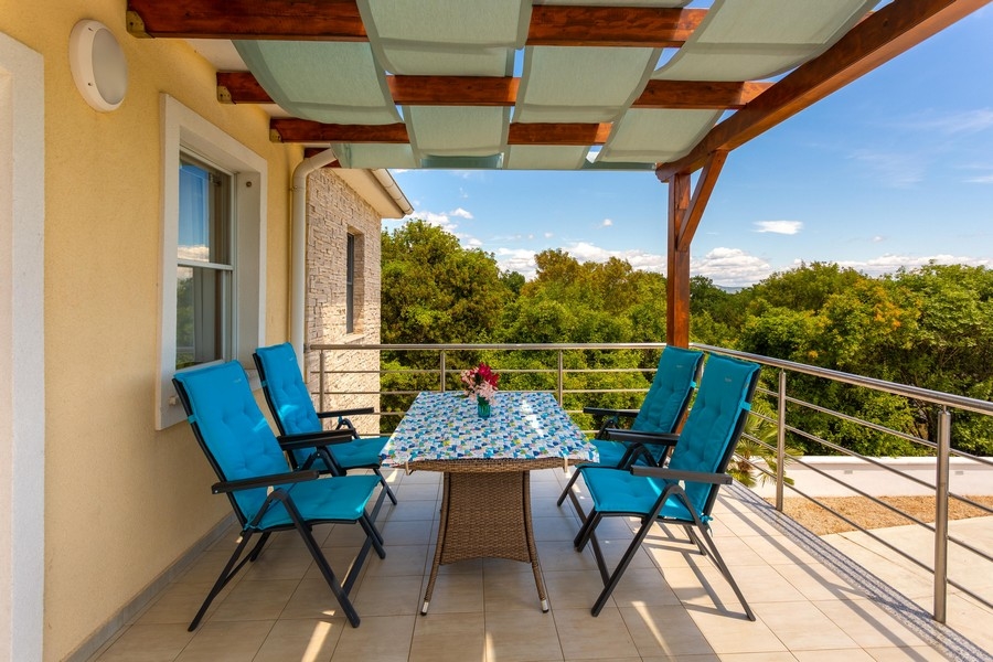 Jedna ze čtyř ložnic.